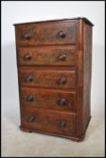 A Victorian mahogany straight five chest of drawers. The flame mahogany bank of drawers, each with