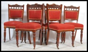 A set of 6 late Victorian mahogany dining chairs being raised on turned legs with overstuffed
