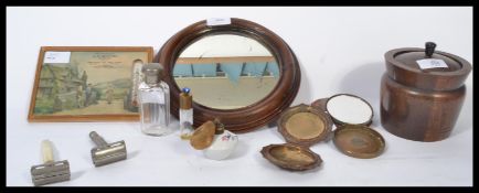 A mixed lot to include a wooden tobacco pot a perfume bottle, circular mirror , razors ,