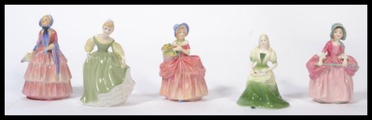 A collection of four pieces of Royal Doulton bone China ceramic figures to include Bo Peep HJN 1811,