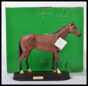 A Beswick connoisseur model Nijinsky 1970 winner of the triple crown, matt brown on wooden plinth.