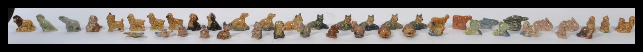 A collection of 40 plus Wade Whimsies to include lion , elephant , giraffe , otter , dove ,