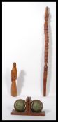 A 20th century carved painted walking stick designed to look like a South American totem