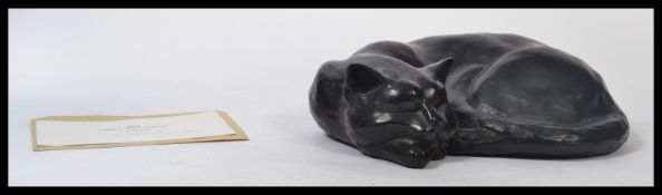 A limited edition 266 / 500 ceramic sculpture of a sleeping cat entitled ' Ben ' by Peter Close