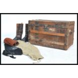 A vintage early 20th century diddy box pertaining to a Vice Admiral containing various clothes