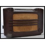 A vintage early 20th century Philips 727a 1930's bakelite valve radio with grille front dials and