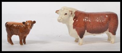 A Beswick Champion of Champions' Hereford cow along with a Beswick calf. Both appearing in good