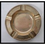 A mid 20th century silver hallmarked ashtray by Walker and Hall Sheffield bearing date marks for