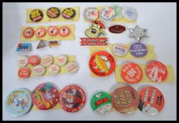A collection of vintage retro advertising collectors  pin badges to include enamel dating from the