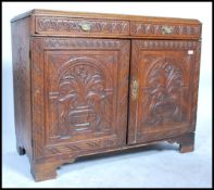 A 19th century country oak cupboard two full lengt