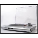 A contemporary 20th century Lenco vinyl record turntable two speed record deck. Measures 46 cm