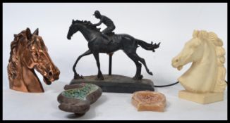 A vintage 20th century horse racing equestrian table lamp along with a copper and resin statue