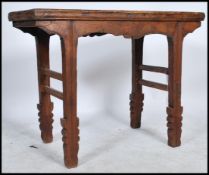 A mid Qing dynasty Chinese antique elm wood wine t