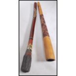 Two traditional  20th century Aboriginal / Australian didgeridoo's with painted animal and geometric