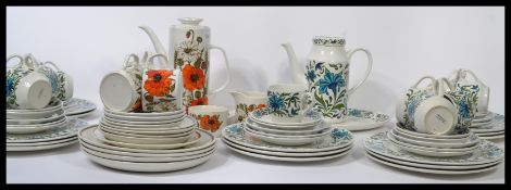 Two retro 20th century ceramic dinner services a Midwinter extensive blue floral retro pattern