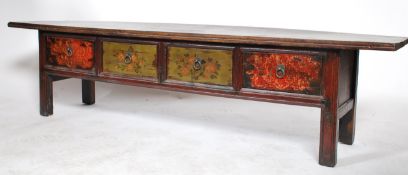 An early 20th century antique Chinese fir wood low