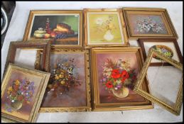 A large collection of ornately gilt framed oil on canvas paintings of various still life scenes of
