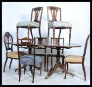 A matched set of 4 Edwardian marquetry inlaid dining chairs together with a good mid to early 20th