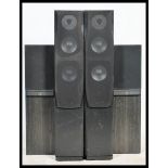 A pair of Mordant Short 25 speakers  together with another pair both finished in ebonised ash.