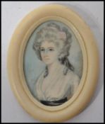 An 18th century portrait miniature painting on ivory of a lady in traditional dress  set to an ivory