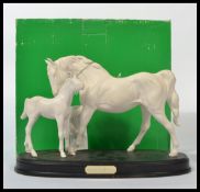 A Beswick Spirit of Affection figurine group on wood base white colourway 2689/2536. Complete in