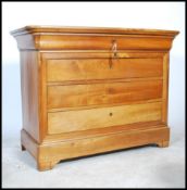 A 19th century French walnut large commode chest of drawers. Raised on a raised plinth base  a