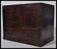 A believed 19th century Japanese scholars table top / desk cabinet having red and black lacquered