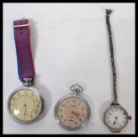 A vintage early 20th century Ingersol Triumph pocket watch together  with another Ingersol Waterbury