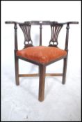 A 19th century Victoruan country house mahogany corner chair / armchair. The curved top rail on lyre