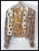 A retro 20th century sequin short ladies jacket purchased by the vendor from Las Vegas, the sequin