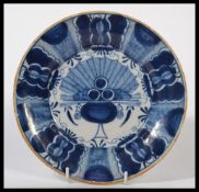 A late 17th / early 18th century C1675-1701 Dutch Delft Three Bells pottery plate hand painted in