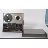 A retro 20th century Sony TC-377 three head stereo reel to reel tape recorder / tapecorder