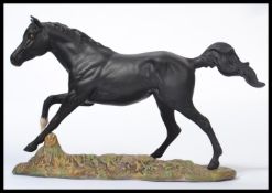 A Royal Doulton model of Black Bess on base DA179 measures 19cms high. In good order with no visible