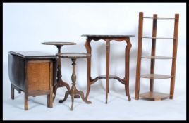 A collection of furniture to include a walnut corner bookcase, 2 Georgian revival wine tables, a