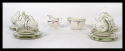 A Royal Doulton early 20th century part tea service model No E9929 / HB9968. The set with