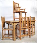 A 20th century Chinese elm wood dining room suite, consisting of table and four matching chairs