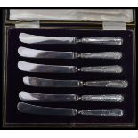 A set of silver hallmarked handled butter knives complete in fitted case. Hallmarked for