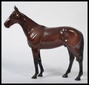 A Beswick connoisseur model Mill Reef winner of the Prix De L'arc De Triomphe 1971, matt brown.