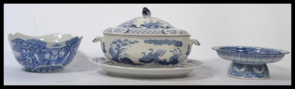 A collection of Chinese ceramics to include a Kang-xi revival footed bowl with geometric patterns, a