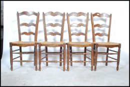 A set of 4 early 20th century French Brittany provincial rattan weave oak ladderback dining