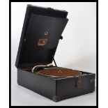 A 1930's HMV picnic portable gramaphone model no 101 having fully appointed interior with swivel key