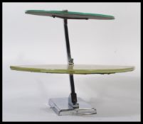 A stunning early 20th century Art Deco chrome and glass two tier display stand, the angle chrome