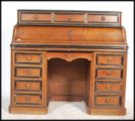 A 19th century Victorian mahogany ebonised dickens desk having a fall front pull out desk with