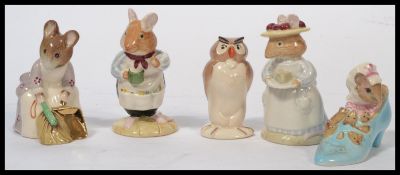 A group of Beswick / Royal Doulton ceramic figures to include Disney Beswick owl , Mr and Mrs