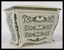 A Royal Doulton Huntley & Palmers biscuit box No.459880 , modelled in the form of a 18th Century