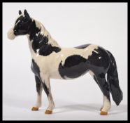 A Beswick Horse Figure ' Pinto Pony ' Piebald Black and White. c.1970's. First Version, Model No