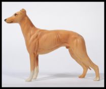 A Beswick Greyhound figurine entitled 'Jolly Roger'. In good order with no visible major damage