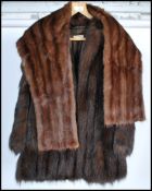 A vintage mid 20th century ladies hip length fur coat retailed by F K Bauers and Sons Bristol