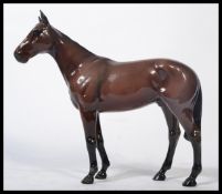 A Beswick horse, Mill Reef, mahogany bay, 2422, gloss finish. Measures 22cms high. In good order