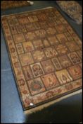 A 20th century Persian Shirvan style rug havin a square panel field with mutliple designs and